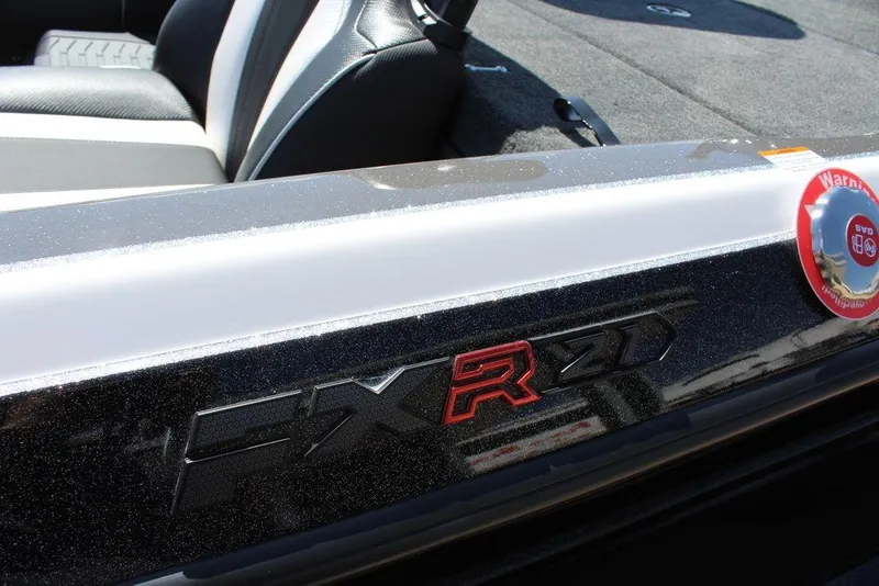 Slide: The Image of 2026 Skeeter FXR21 FLEX boat interior with logo detail. - 16