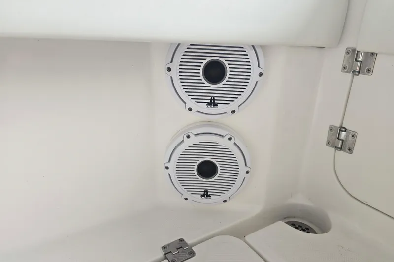 Slide: The Image of Speakers on 2022 Invincible 33 Catamaran, white interior detail. - 49