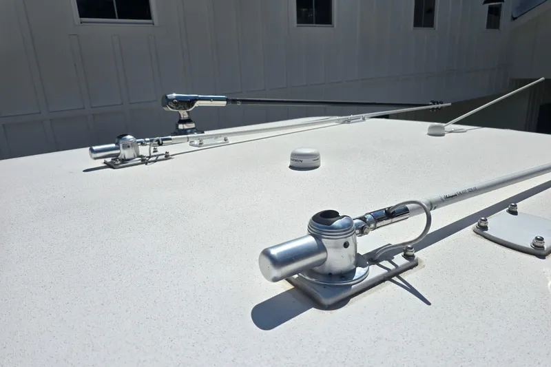 Slide: The Image of Rooftop view of 2022 Invincible 33 Catamaran with mounted antennas and equipment. - 52