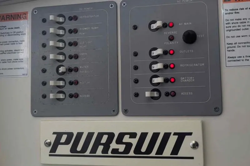 Slide: The Image of Electrical control panel on a 2001 Pursuit 2870 Walkaround boat. - 20