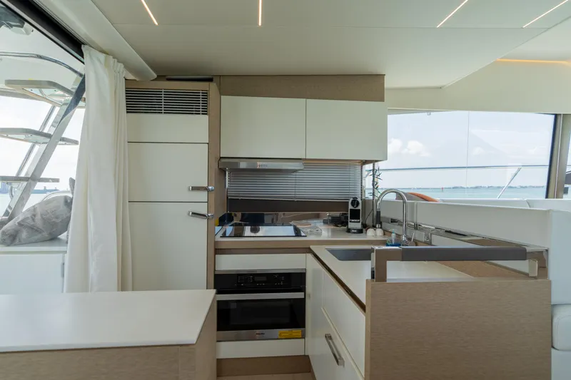 Slide: The Image of Modern kitchen area in 2019 Prestige 520 Flybridge yacht. - 21