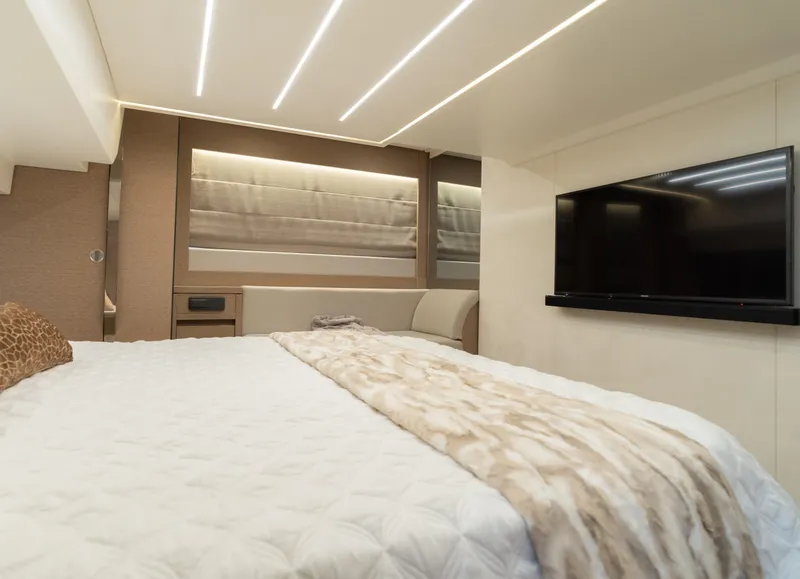 Slide: The Image of Luxurious bedroom interior of 2019 Prestige 520 Flybridge yacht with modern lighting. - 8