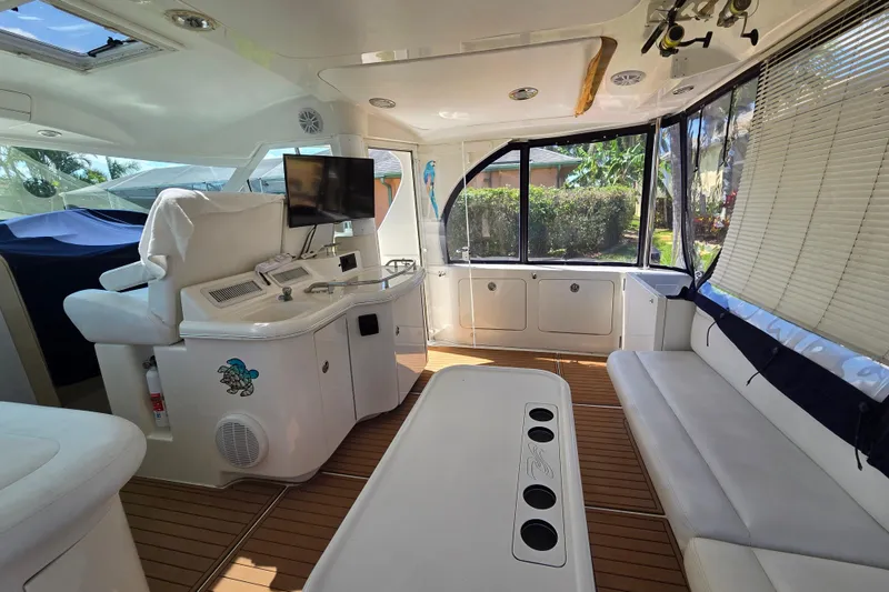 Slide: The Image of Luxurious interior of a 2004 Sea Ray 480 Motor Yacht with seating and entertainment area. - 22