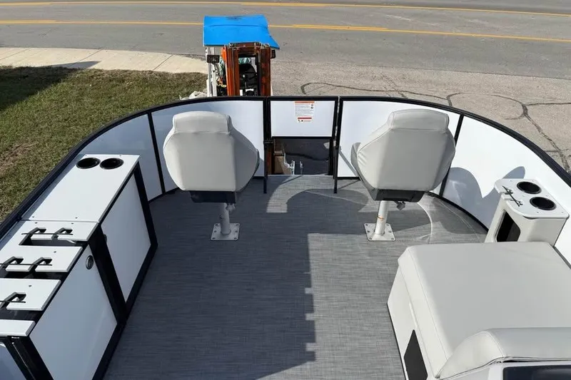 Slide: The Image of 2026 Lowe LF 194 boat interior with seating and storage compartments. - 10