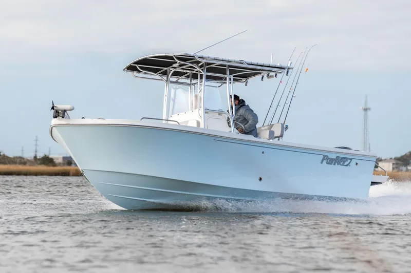 Slide: The Image of Manufacturer Provided Image: 2026 Parker 210 Coastal boat cruising on water with Yamaha engine, two people onboard. - 5