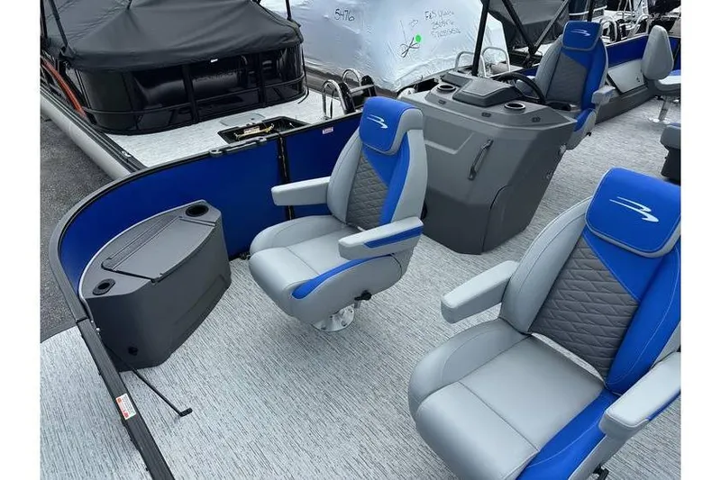 Slide: The Image of 2026 Bennington 23 SF Family boat with blue and gray seating, featuring four fish seats. - 10