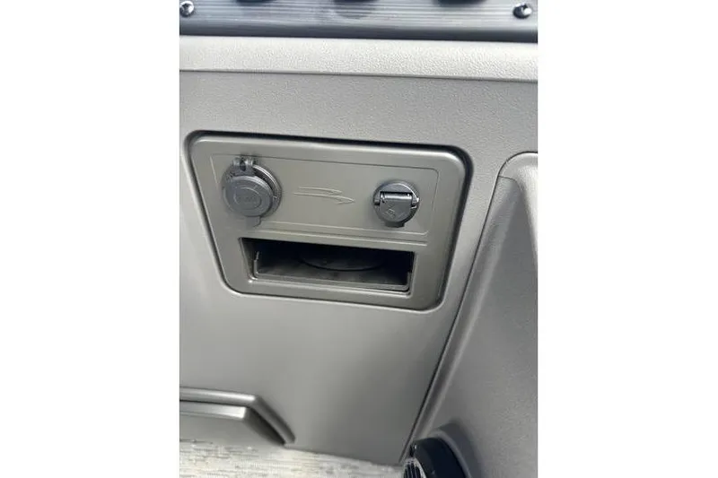 Slide: The Image of Control panel of 2026 Bennington 23 SF Family boat, featuring power outlets. - 21