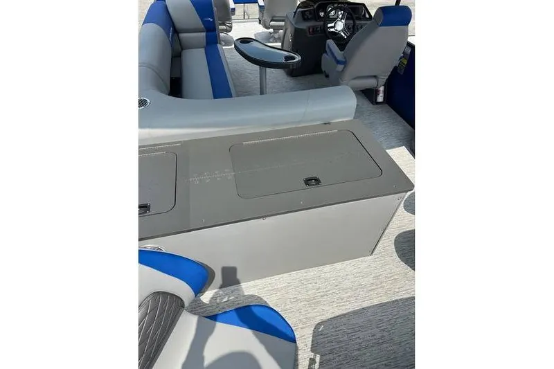 Slide: The Image of 2026 Bennington 23 SF Family boat interior with seating and control panel. - 25