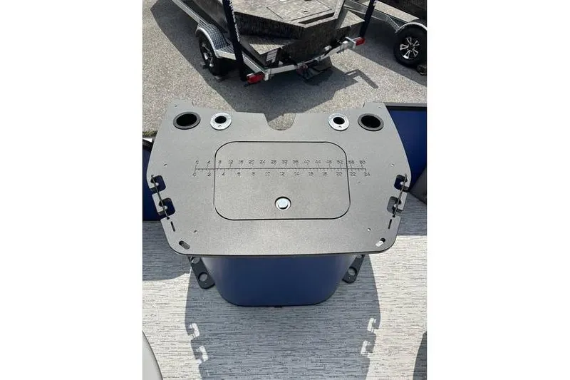 Slide: The Image of 2026 Bennington 23 SF Family boat fishing station with measurement guide and cup holders. - 31