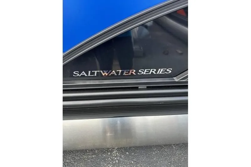 Slide: The Image of 2026 Bennington 23 SF Family Saltwater Series boat detail with logo. - 39