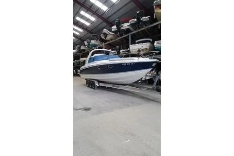 Slide: The Image of 2004 Formula 330 Sun Sport boat in storage facility. - 4