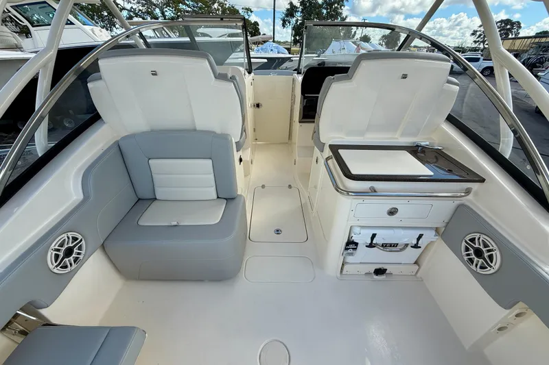 Slide: The Image of 2026 Scout 255 Dorado boat interior with seating, storage, and sleek design. - 14