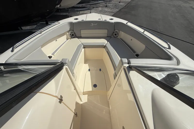 Slide: The Image of 2026 Scout 255 Dorado boat interior with spacious seating and sleek design. - 24