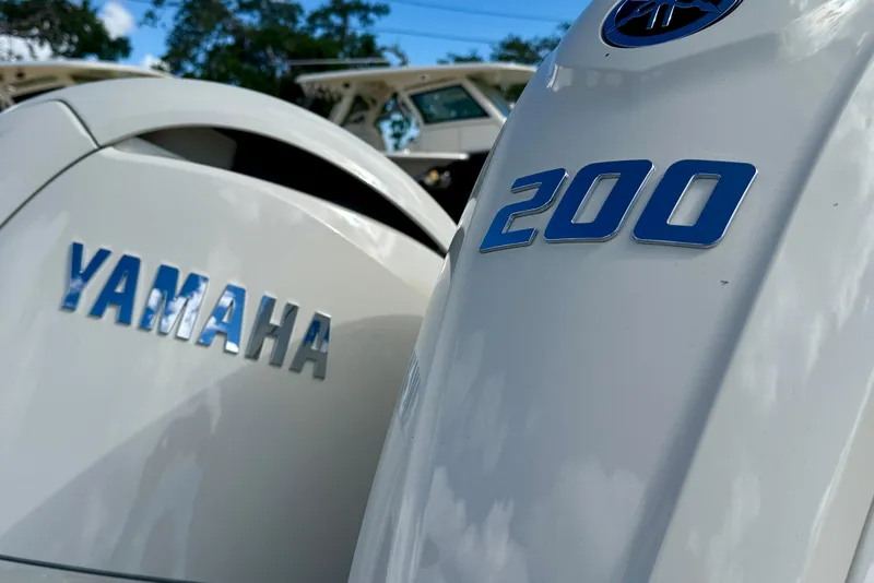 Slide: The Image of Yamaha 200 outboard engines on a 2026 Scout 255 Dorado boat. - 30