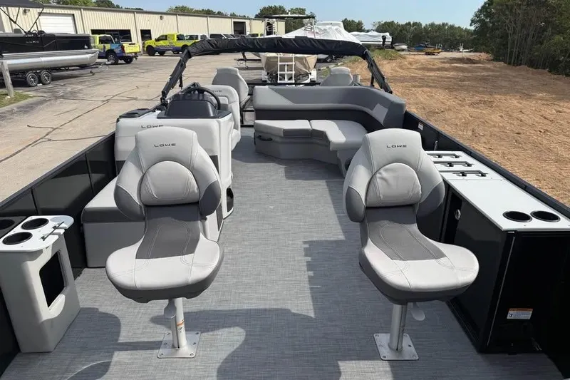 Slide: The Image of 2026 Lowe LF 214 pontoon boat with gray seating and spacious deck layout. - 10