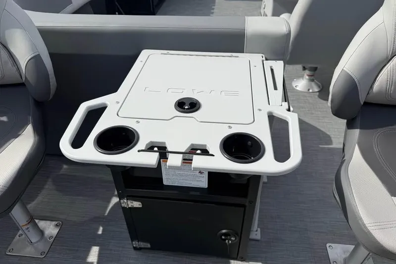 Slide: The Image of Lowe LF 214 boat interior with seating and table, 2026 model. - 12