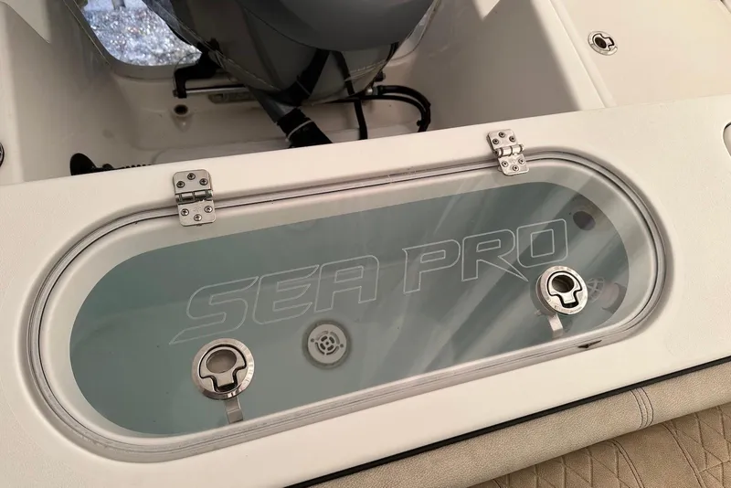 Slide: The Image of 2022 Sea Pro 239 Center Console boat with branded livewell lid. - 21