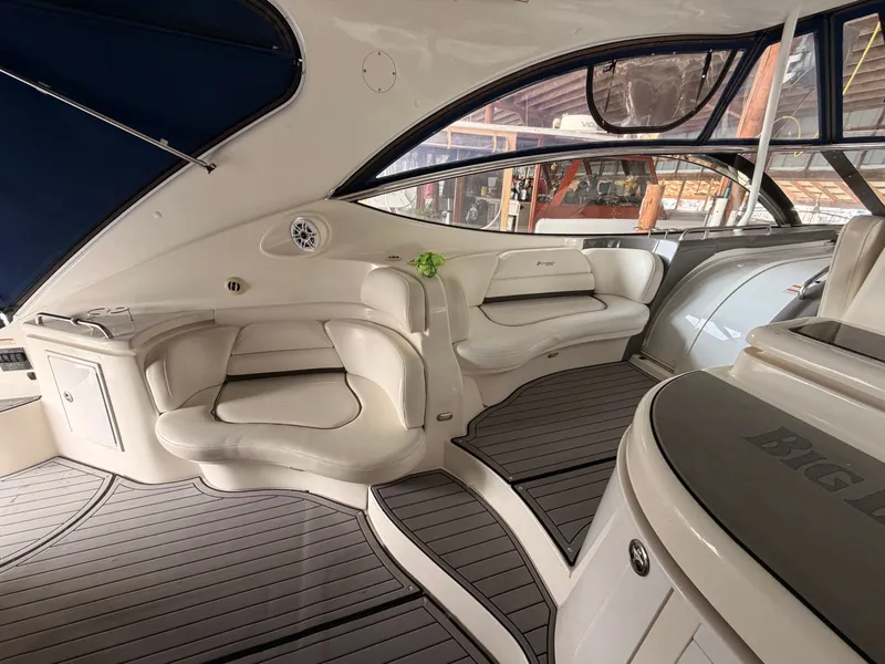 Slide: The Image of Luxurious interior of 2006 Cruisers Yachts 560 Express with elegant seating and sleek design. - 9