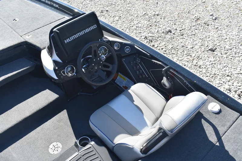 Slide: The Image of 2023 Skeeter ZXR20 boat cockpit with Humminbird electronics and comfortable seating. - 8