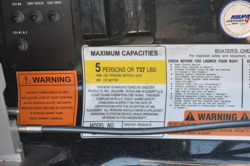 Slide: The Image of 2023 Skeeter ZXR20 boat capacity and safety warnings, highlighting maximum load and operational guidelines. - 9