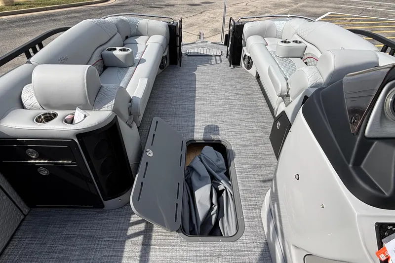Slide: The Image of Luxurious interior of 2026 JC Sporttoon 26TT pontoon boat with plush seating and storage. - 27