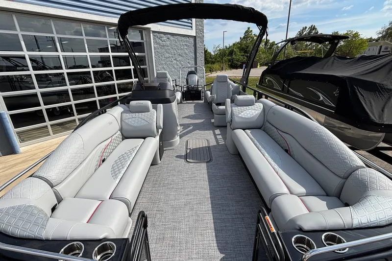 Slide: The Image of 2026 JC Sporttoon 26TT pontoon boat with luxurious seating and modern design. - 34