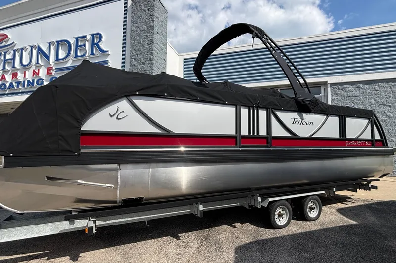 Slide: The Image of 2026 JC Sporttoon 26TT pontoon boat with black cover at Thunder Marine. - 6