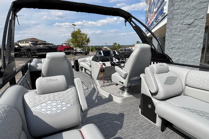 Slide: The Image of Luxurious 2026 JC Sporttoon 26TT pontoon boat with elegant seating and modern design. - 11