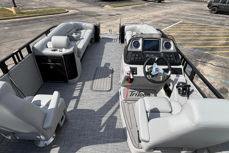 Slide: The Image of Luxury pontoon boat interior, JC Sporttoon 26TT 2026, featuring plush seating and modern controls. - 19