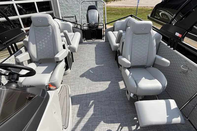 Slide: The Image of 2026 JC Sporttoon 26TT pontoon boat with luxurious seating and modern design. - 25