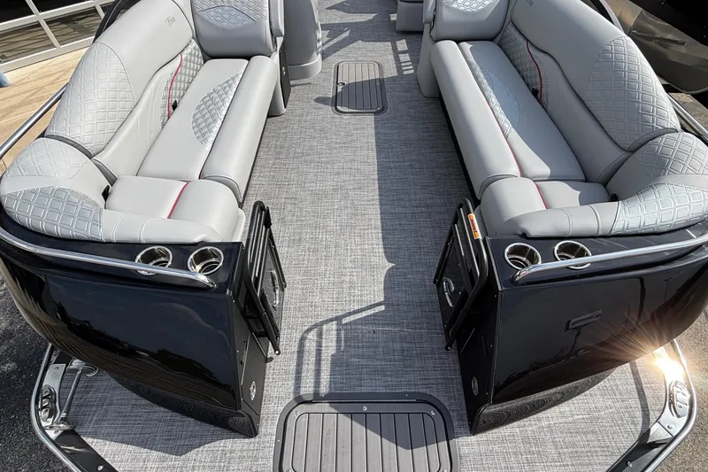 Slide: The Image of Luxurious interior of 2026 JC Sporttoon 26TT pontoon boat with plush seating and cup holders. - 33