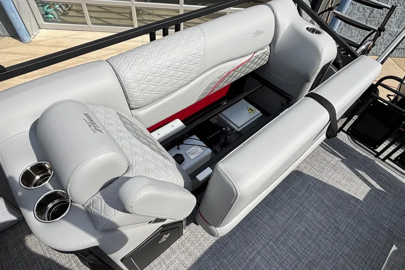 Slide: The Image of Luxurious seating on 2026 JC Sporttoon 26TT pontoon boat with quilted upholstery and cup holders. - 7