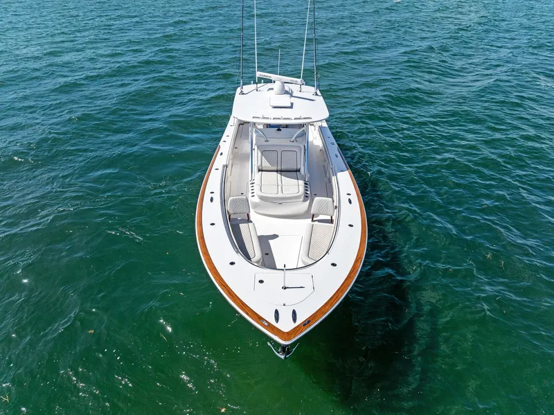 Slide: The Image of 2021 Valhalla Boatworks V-41 on clear blue water, aerial view. - 11