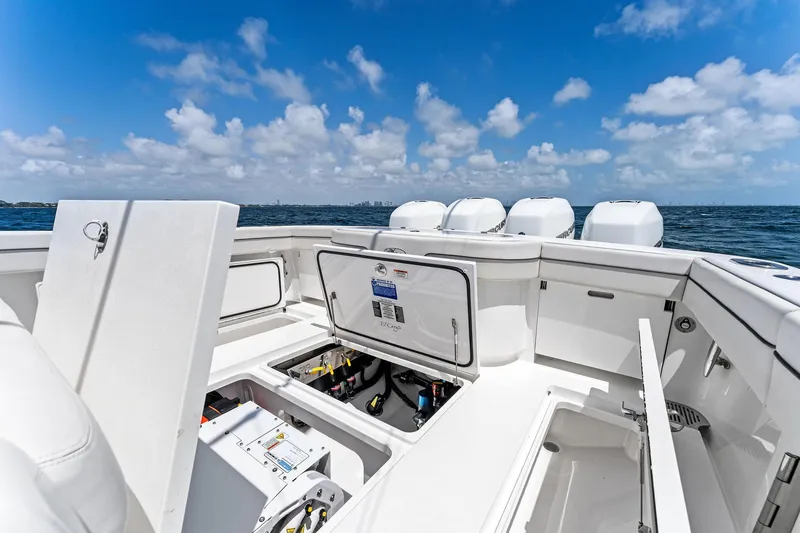 Slide: The Image of 2021 Valhalla Boatworks V-41 with open storage compartments, ocean view, and clear blue sky. - 33
