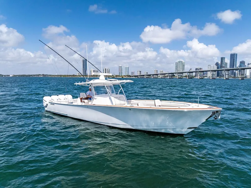 Slide: The Image of 2021 Valhalla Boatworks V-41 on open water with city skyline in background. - 4