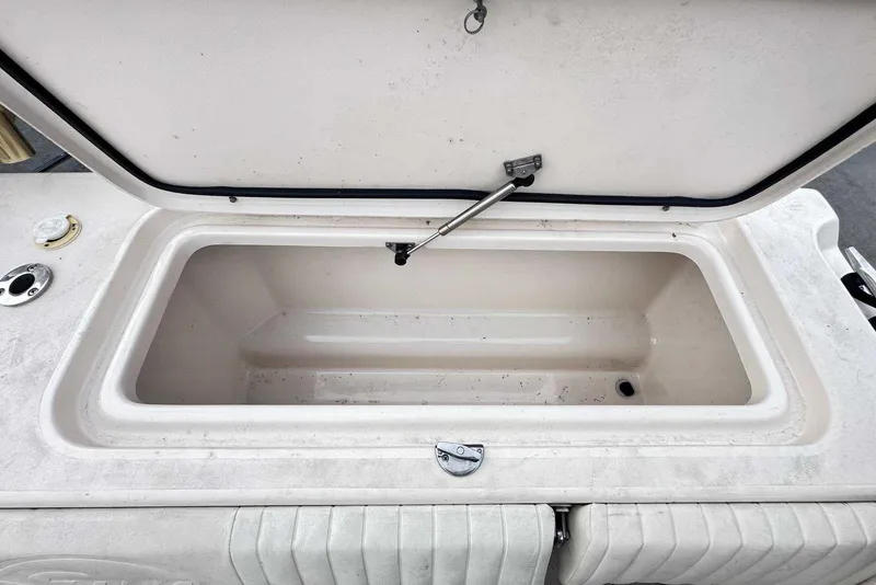 Slide: The Image of Open storage compartment on 2007 Grady-White Tournament 225 boat. - 13