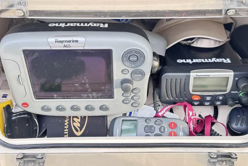 Slide: The Image of Marine electronics in a 2007 Grady-White Tournament 225 boat, featuring Raymarine devices. - 23