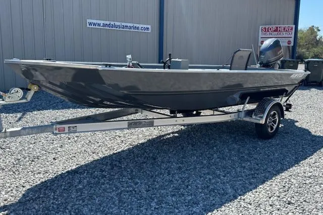 The Image of 2025 Alweld 1856 PF boat on trailer, displayed outdoors at Andalusia Marine. - 1