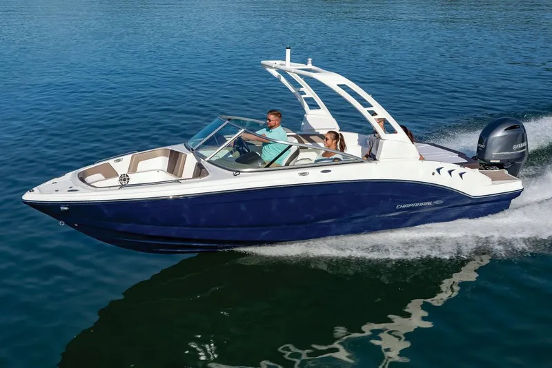 Slide: The Image of Manufacturer Provided Image: 2025 Chaparral 23 SSi OB boat cruising on clear blue water. - 1