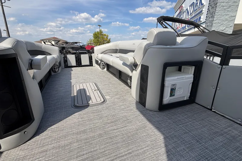 Slide: The Image of 2026 JC NEPTOON 27TT SPORT pontoon boat interior with plush seating and modern design. - 24