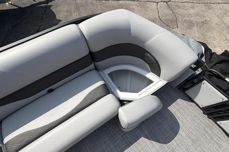 Slide: The Image of Luxury seating on 2026 JC NEPTOON 27TT SPORT boat, featuring storage compartment. - 29