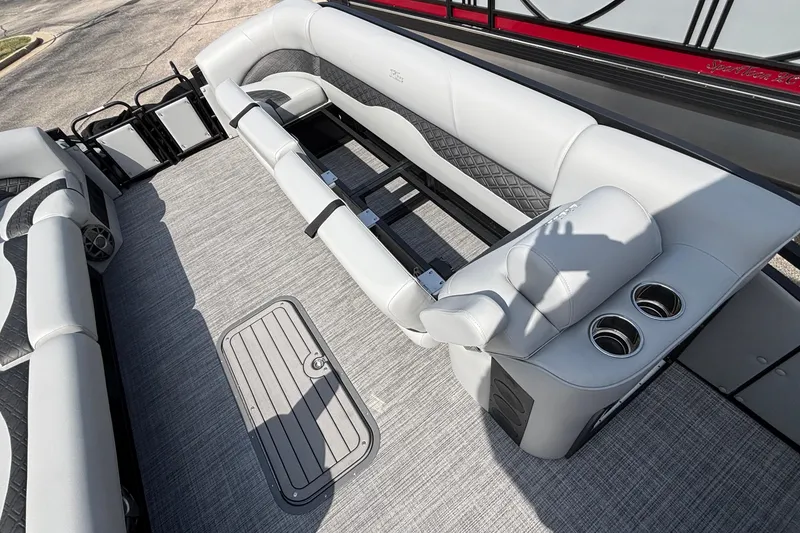 Slide: The Image of Luxurious interior of 2026 JC NEPTOON 27TT SPORT boat with plush seating and cup holders. - 30