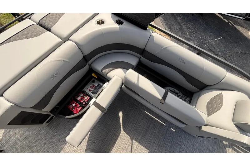Slide: The Image of Luxurious seating on 2026 JC NEPTOON 27TT SPORT boat with storage compartment open. - 21