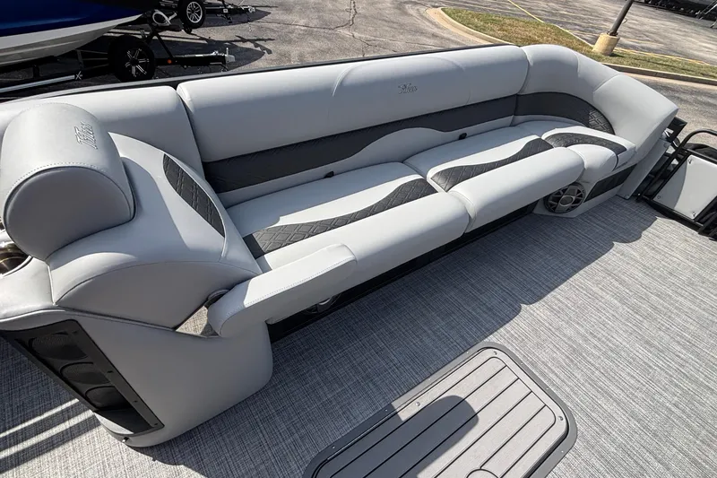 Slide: The Image of Luxurious seating on 2026 JC NEPTOON 27TT SPORT boat, featuring sleek gray upholstery. - 26