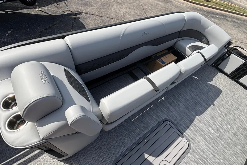 Slide: The Image of Luxurious seating on 2026 JC NEPTOON 27TT SPORT boat with storage and cup holders. - 28