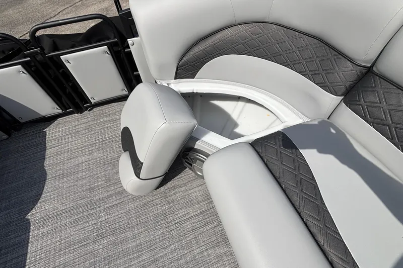 Slide: The Image of 2026 JC NEPTOON 27TT SPORT boat interior with open storage compartment and cushioned seating. - 31