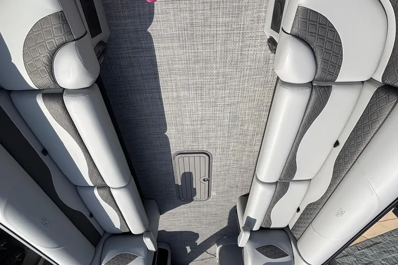 Slide: The Image of Luxurious seating on 2026 JC NEPTOON 27TT SPORT boat, featuring elegant gray upholstery. - 33