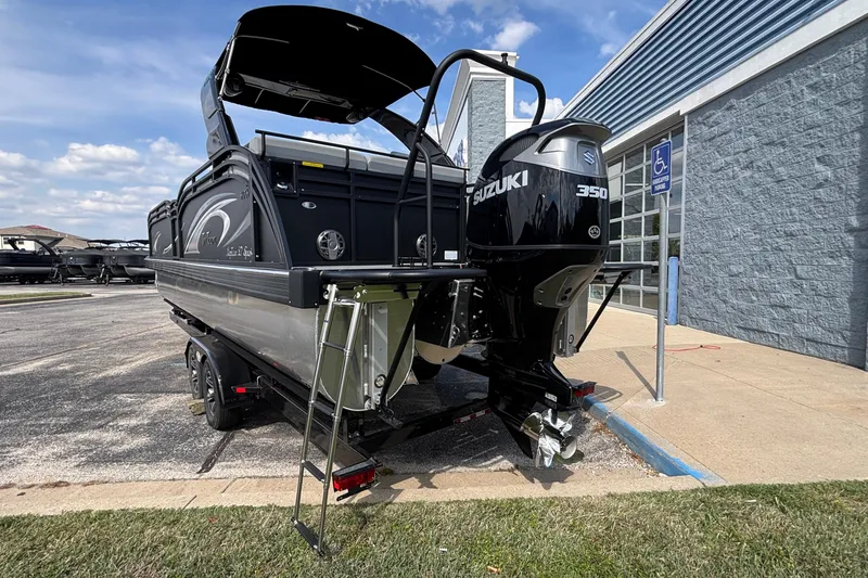 Slide: The Image of 2026 JC NEPTOON 27TT SPORT boat with Suzuki 350 engine, parked near a building. - 44