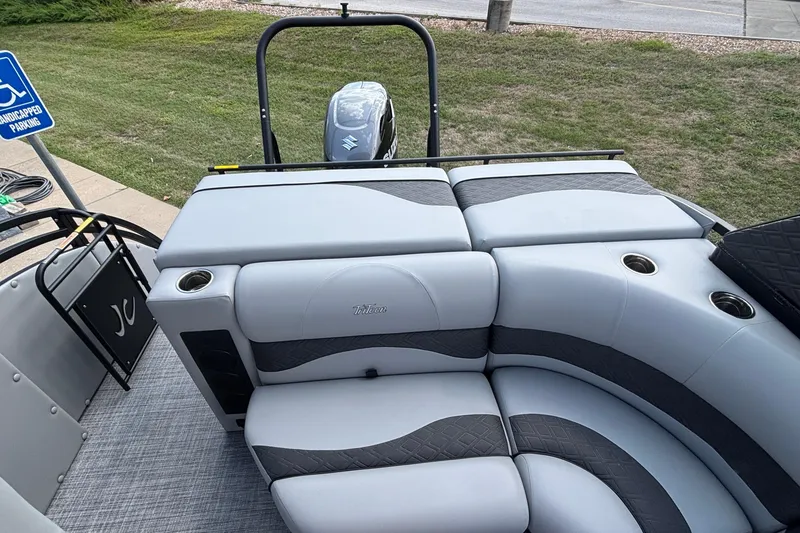 Slide: The Image of 2026 JC NEPTOON 27TT SPORT boat interior with gray seating and cup holders. - 5