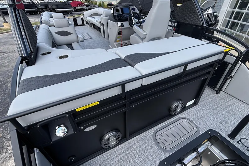 Slide: The Image of 2026 JC NEPTOON 27TT SPORT boat interior with luxurious seating and modern dashboard. - 8